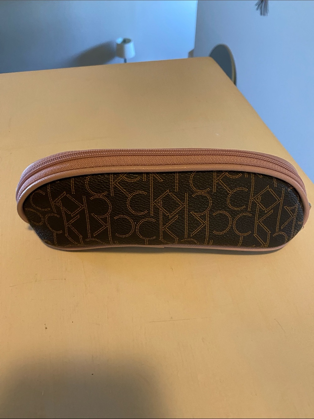 Calvin Klein Brown Monogram Cosmetic Pouch with Pink Trim